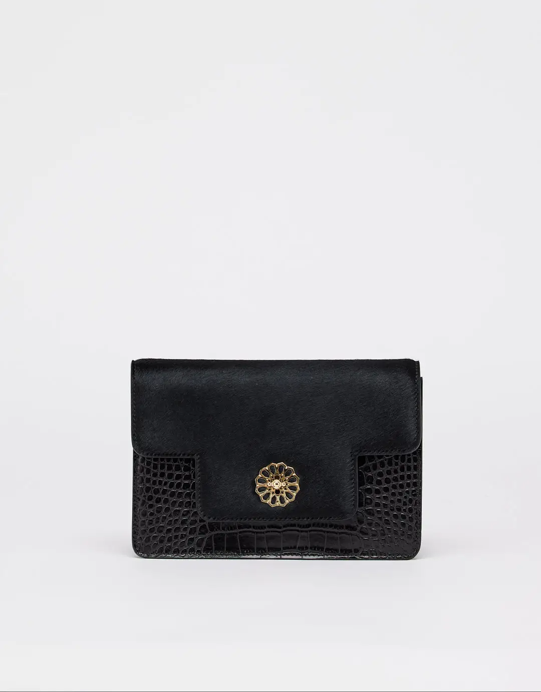 This feminine shoulder bag with a flap is made of calf leather and fur. The Andalous with Croco print is handcrafted from high-quality materials and will turn heads wherever you go. This elegant small bag features an additional storage compartment closed with a zipper, a leather handle, and a mosaic golden magnetic closure, making it both fashionable and functional.