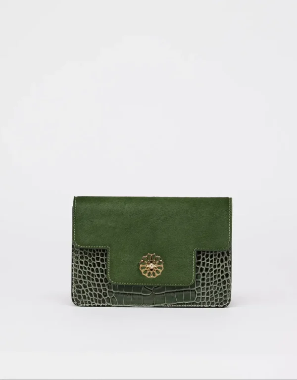 This feminine shoulder bag with a flap is made of calf leather and fur. The Andalous with Croco print is handcrafted from high-quality materials and will turn heads wherever you go. This elegant small bag features an additional storage compartment closed with a zipper, a leather handle, and a mosaic golden magnetic closure, making it both fashionable and functional.