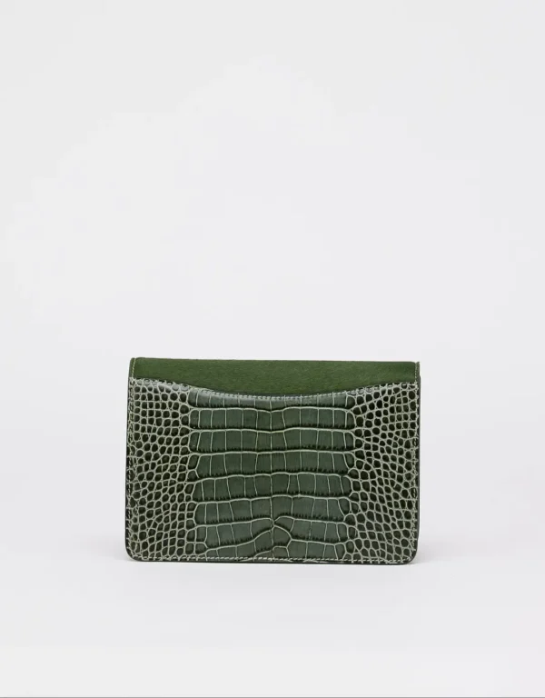 This feminine shoulder bag with a flap is made of calf leather and fur. The Andalous with Croco print is handcrafted from high-quality materials and will turn heads wherever you go. This elegant small bag features an additional storage compartment closed with a zipper, a leather handle, and a mosaic golden magnetic closure, making it both fashionable and functional.