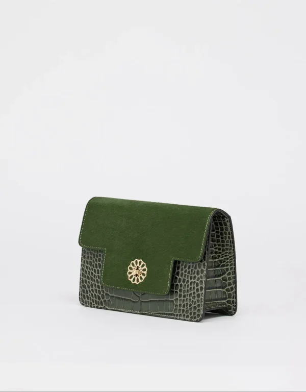 This feminine shoulder bag with a flap is made of calf leather and fur. The Andalous with Croco print is handcrafted from high-quality materials and will turn heads wherever you go. This elegant small bag features an additional storage compartment closed with a zipper, a leather handle, and a mosaic golden magnetic closure, making it both fashionable and functional.