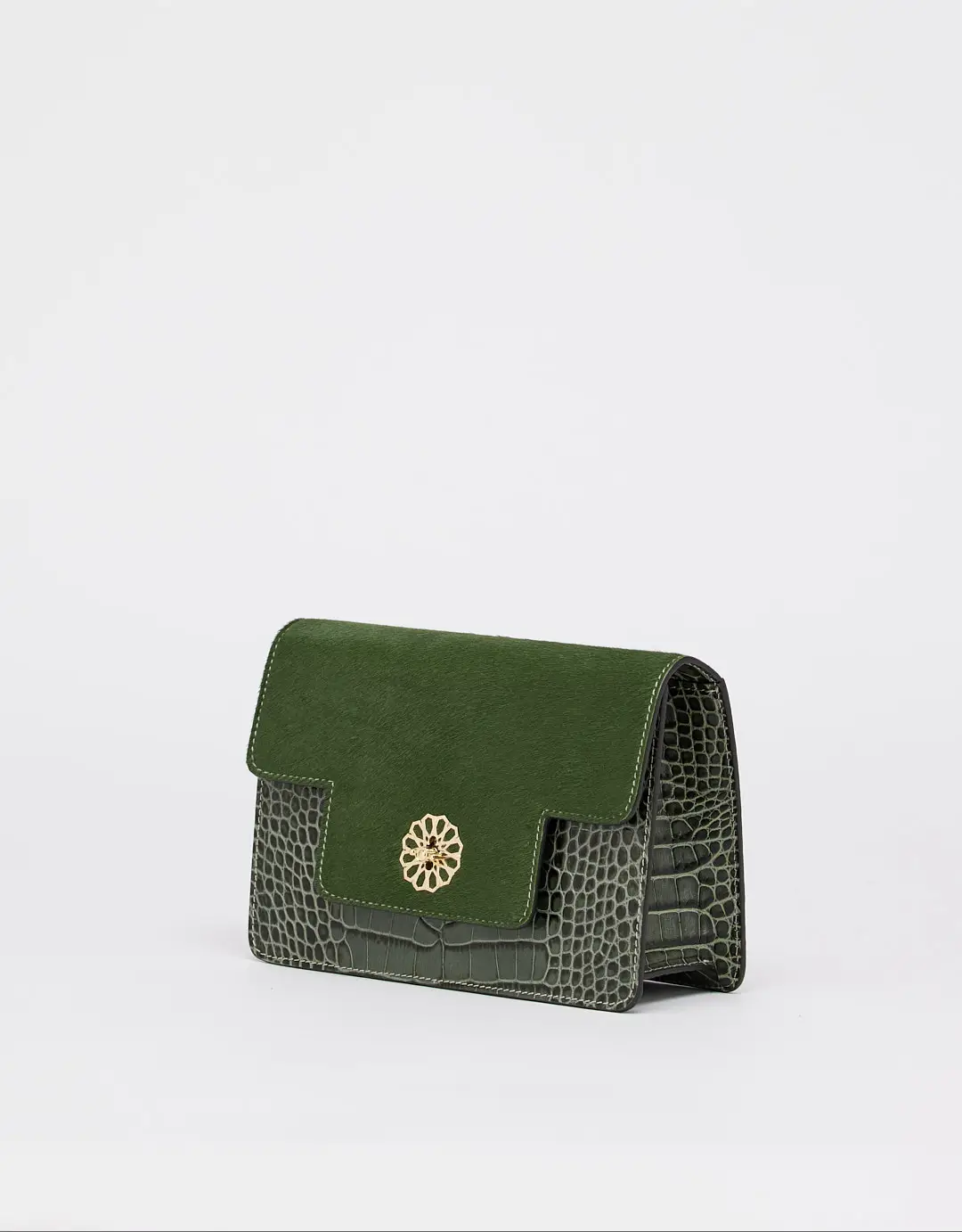 This feminine shoulder bag with a flap is made of calf leather and fur. The Andalous with Croco print is handcrafted from high-quality materials and will turn heads wherever you go. This elegant small bag features an additional storage compartment closed with a zipper, a leather handle, and a mosaic golden magnetic closure, making it both fashionable and functional.
