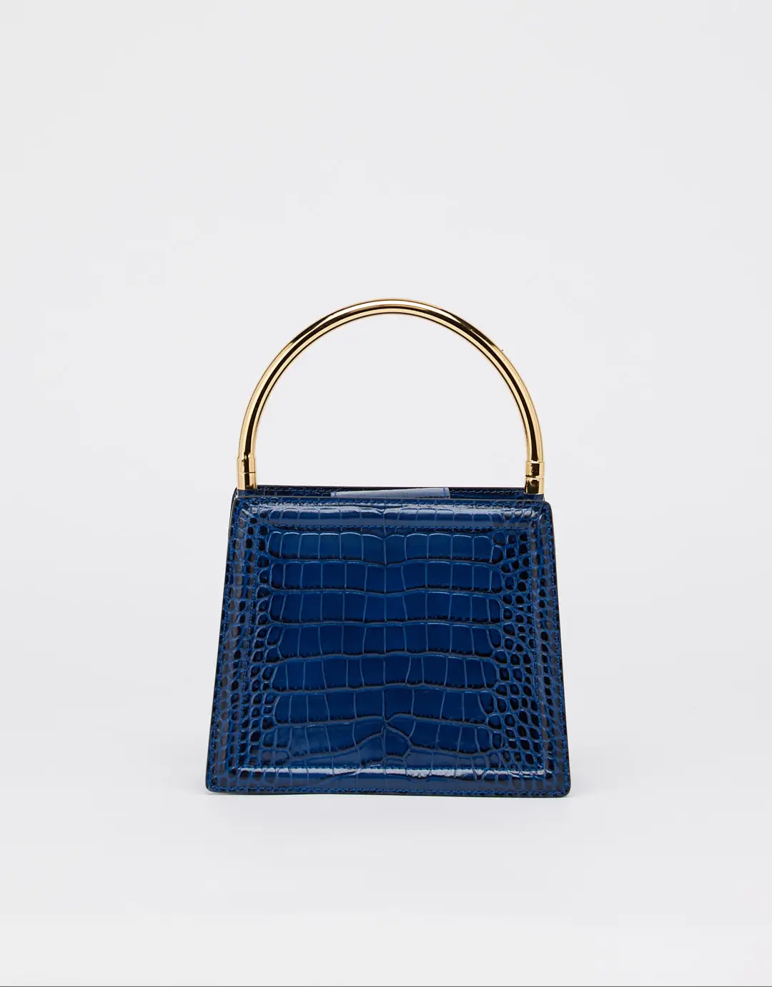 This beautiful leather handbag is perfect for any sophisticated woman who wants to make a statement. The croco print is eye-catching and unique, while the gold details add a touch of luxury. The detachable long strap makes it easy to carry, and the Nora's print adds a touch of personality.