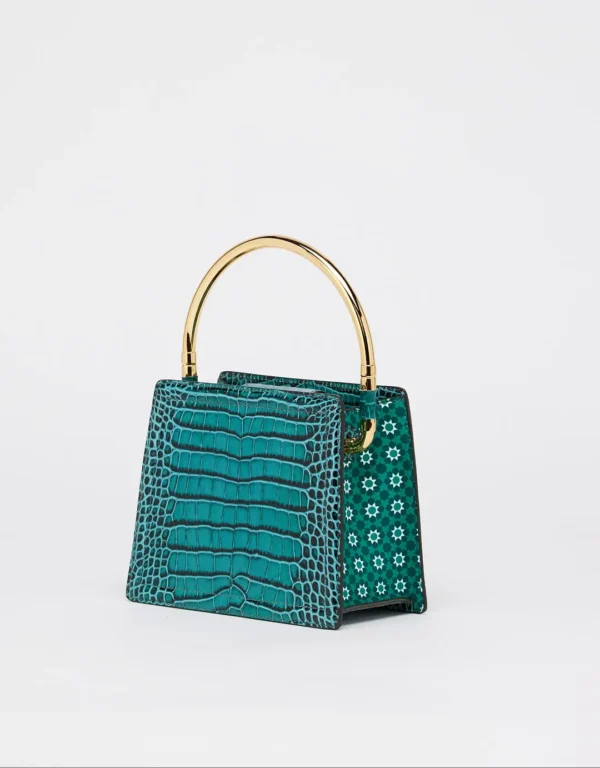 This beautiful leather handbag is perfect for any sophisticated woman who wants to make a statement. The croco print is eye-catching and unique, while the gold details add a touch of luxury. The detachable long strap makes it easy to carry, and the Nora's print adds a touch of personality.