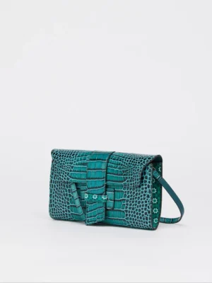 This beautiful and versatile leather handbag is the perfect accessory for busy ladies who want to make a smooth transition from day to evening wear. The luxurious Maxima clutch is crafted from calf leather with a Croco print completed by a leather closure and an interior pocket with a zipper. It features a Moroccan colorful mosaic design on the sides and can be worn as a shoulder bag, crossbody bag, or clutch bag by adjusting the long detachable strap, making it a perfect option for any occasion.