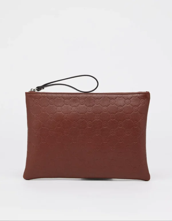 Pochette Arabesque is a handmade modern piece made of Tuscany high quality calf leather embossed with the Moroccan mosaic pattern. Worn as a clutch during the day or in the evening, or slipped into a larger bag. This model closed with interior compartments can also accommodate office essentials such as documents or a tablet.