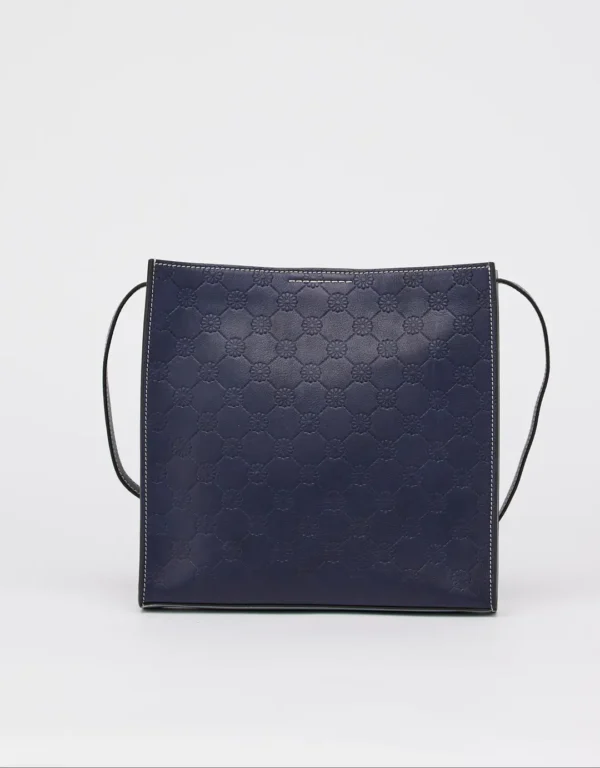 This genuine handmade leather bag with embossed prints is crafted from high-quality calf leather and designed to carry all your essentials. It contains an extra compartment for valuable stuff and an adjustable strap to wear it comfortably as a crossbody or as a shoulder bag depending on your preference. This unisex, classy, and chic bag with colors combination has a beautiful story to tell from its unique design. Whether you're running errands or headed to a party, this bag will add a touch of luxury to your look.
